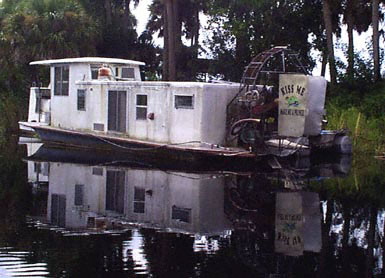 Houseboat with airboat engine.